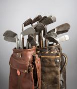 23 hickory shafted irons,
the lot including one smooth faced by Gibson of Kinghorn,