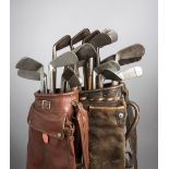 23 hickory shafted irons,
the lot including one smooth faced by Gibson of Kinghorn,