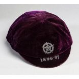 A purple England v Scotland international cap awarded to Tommy Crawshaw in season 1896-97,