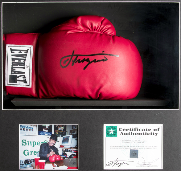 A Joe Frazier signed boxing glove,
a red Everlast right-hand glove signed in black marker pen,