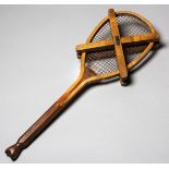 A Slazenger "Demon" lawn tennis racquet circa 1890,
with fishtail handle, slim grip, fine condition,