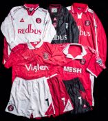 A group of five Shaun Newton Charlton Athletic jerseys,
i) a short-sleeved red no.