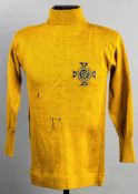 A yellow Northern Ireland goalkeeping jersey 1920s,
a woollen sweater with roll neck, long-sleeved,