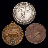Two 1950 World Cup commemorative medals,
