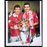 A Manchester United legends Bryan Robson and Eric Cantona double-signed colour photograph,
