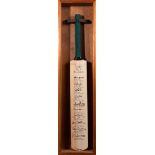 A limited edition cricket bat signed at the time by the world's top 10 runmakers in Test Matches,