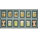 A pair of Tom Browne displays of humorous cricket postcards,
6 postcards in each frame,