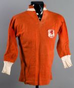 Fred Cook: a red Wales international jersey circa 1925,
by St Margaret's, long-sleeved,