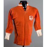 Fred Cook: a red Wales international jersey circa 1925,
by St Margaret's, long-sleeved,