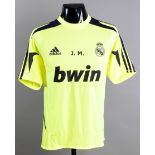 A Jose Mourinho Real Madrid training shirt season 2012-13,
inscribed with the initials J.M.