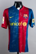 Samuel Eto'o: a team-signed blue & red striped Barcelona No.