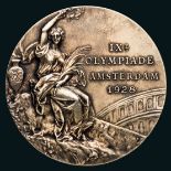 An Amsterdam 1928 Olympic Games gold winner's prize medal awarded to the Swedish heavyweight