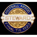 A gilt-metal & enamel Football Association steward's badge for the first F.A.