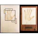 The handprints of Muhammad Ali and Larry Holmes,
from the Boxing Series produced by Silkroadgifts,