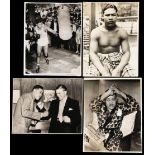 A group of 72 b&w photographs featuring the boxer Joe Louis dating between the mid-1930s and