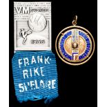 A gold & enamel medallion and a tournament player's badge presented to the French player Yvon Douis