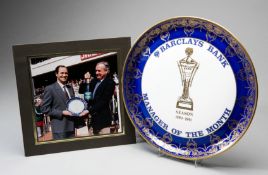 A Manager of the Month Award presented to George Graham of Arsenal in season 1990-91,