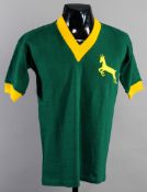 A green South Africa XI football jersey 1958,
short-sleeved with gold cuffs,