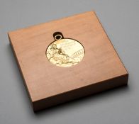 A Montreal 1976 Olympic Games gold winner's prize medal for rowing,
In silver-gilt, 60mm.