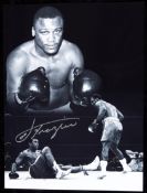 A signed b&w Joe Frazier photo print,
16 by 12in.