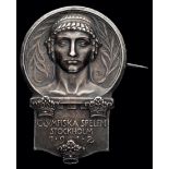 A Stockholm 1912 Olympic Games participation lapel badge,
silvered metal by Sporrong & Co.