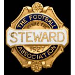 A gilt-metal & enamel Football Association steward's badge for the Arsenal v Cardiff City F.A.