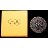 A Cortina 1956 Winter Olympic Games participation medal,
In bronze 45mm, by C.