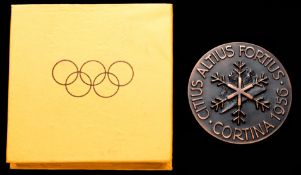 A Cortina 1956 Winter Olympic Games participation medal,
In bronze 45mm, by C.