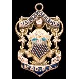 A 9ct.gold & enamel Manchester Senior Cup medal awarded to R.