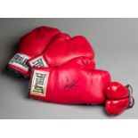 A group of boxing gloves signed by American champions,