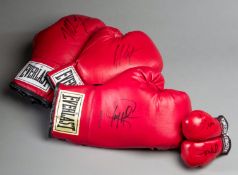 A group of boxing gloves signed by American champions,