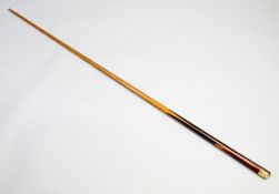 A snooker cue formerly owned and used by Alex "Hurricane" Higgins,