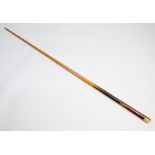 A snooker cue formerly owned and used by Alex "Hurricane" Higgins,