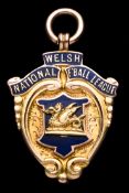 A 9ct. gold & enamel Welsh National Leag