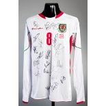 Aaron Ramsey: a team-signed white Wales No.