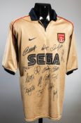 A team-signed gold Arsenal away jersey from the 2001-02 double-winning season,