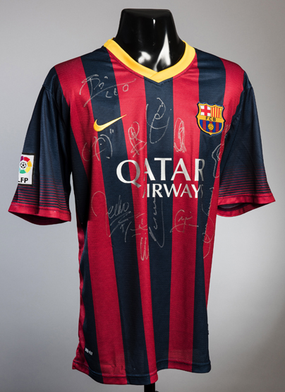 A team-signed FC Barcelona replica jersey,
Signed in silver marker pen by Lionel Messi, Neymar Jr,