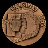 A Helsinki 1952 Olympic Games participant's medal,
designed by K Rasanen,