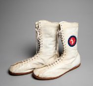 A signed pair of Muhammad Ali boxing boots,