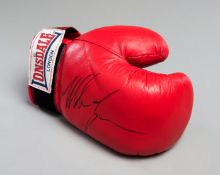 A Mike Tyson signed glove,