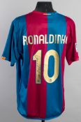 Brazilian signed football kit,
comprising: a replica red & blue striped Barcelona No.