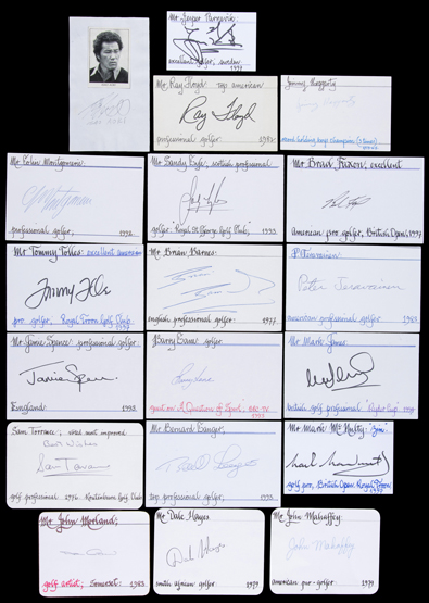 A group of white index cards autographed by golfers,
Mark James, Bernhard Langer, Ray Floyd,