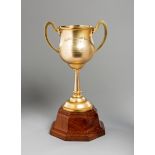 The 1931 Caulfield Cup,
an 18ct. gold two-handled trophy cup by T. Gaunt & Co.