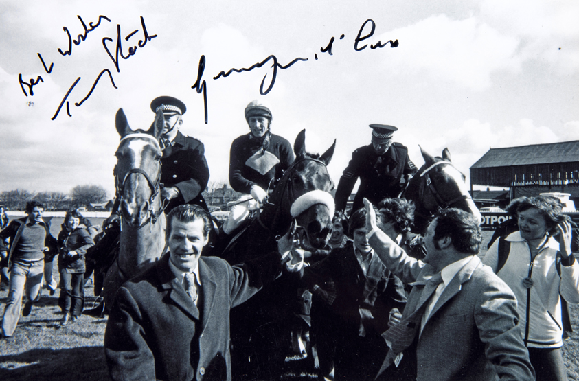 A Red Rum 1977 Grand National photograph double-signed by Tommy Stack and Ginger McCain,
8 by 12in.
