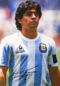 A Maradona signed photograph printed on canvas,
signature in black marker pen,