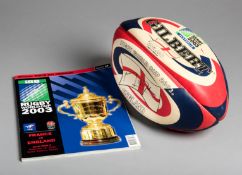 A 2003 Rugby World Cup souvenir ball signed by the winning captain Martin Johnson,