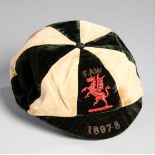 Edwin James: a green & white quartered Wales international cap 1897-98,
inscribed F.A.W.