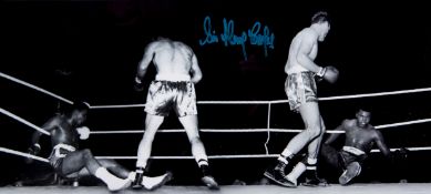 A Sir Henry Cooper signed photograph,