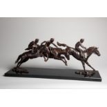 Emma MacDermott (contemporary)
THREE RACEHORSES AND JOCKEYS JUMPING A FENCE
signed E MacD,