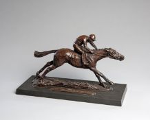 A resin bronze sculpture of a racehorse and jockey titled "1,